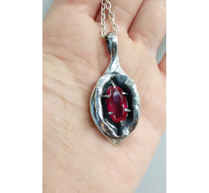 Silver yoni pendant with ruby