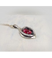Silver yoni pendant with ruby