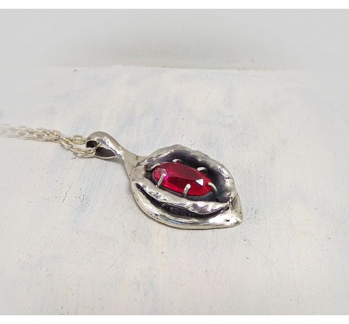 Silver yoni pendant with ruby