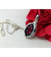 Silver yoni pendant with ruby