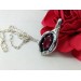 Silver yoni pendant with ruby